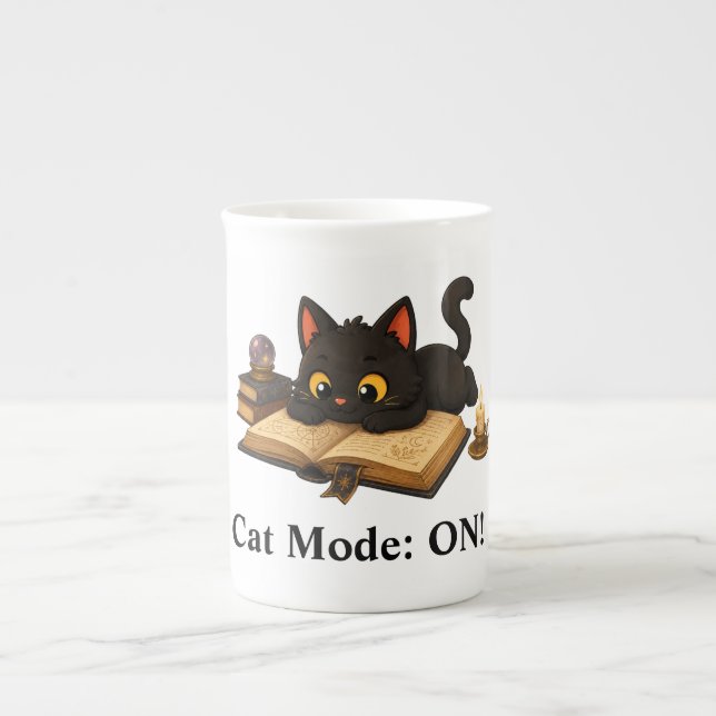 Ziggy the black cat reading a book bone china mug (Front)
